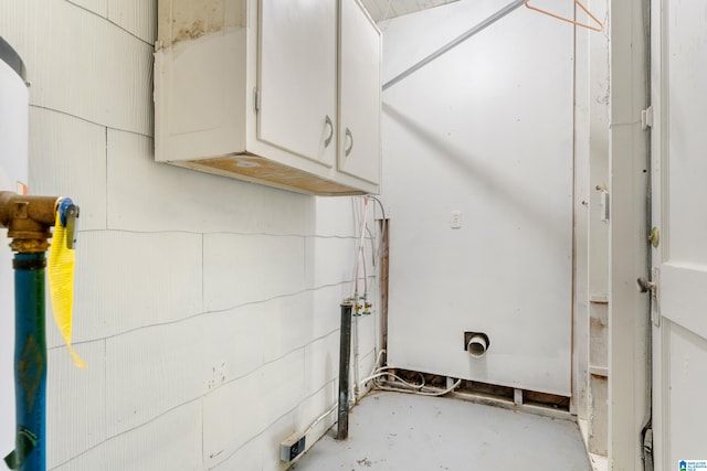 laundry room with cabinets