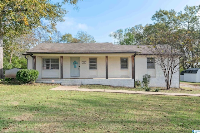 single story home featuring a front yard and a porch