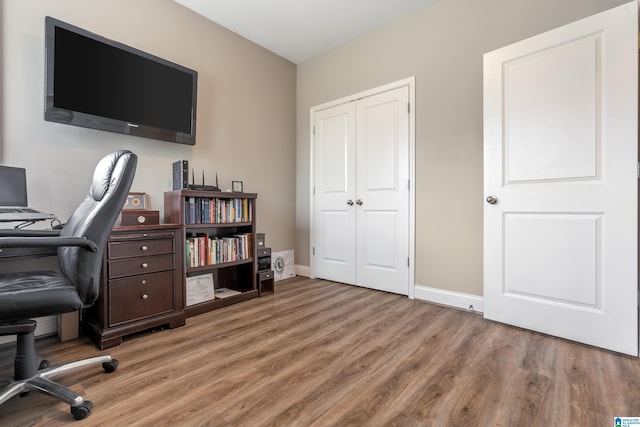 home office featuring hardwood / wood-style flooring