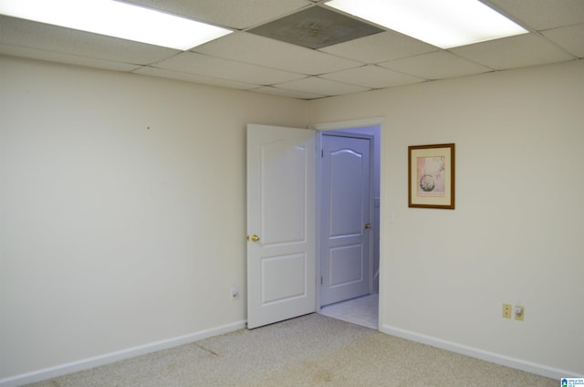 empty room featuring light colored carpet