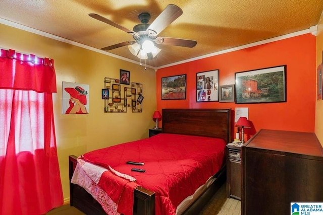 bedroom with a textured ceiling, ceiling fan, and crown molding