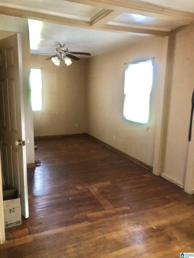 2724 20th Pl, Ensley, Birmingham, AL 35208 - spare room featuring a ceiling fan, baseboards, and dark wood-type flooring