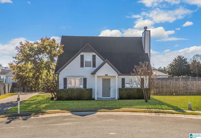 view of front of property with a front lawn