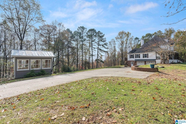 view of yard with a garage