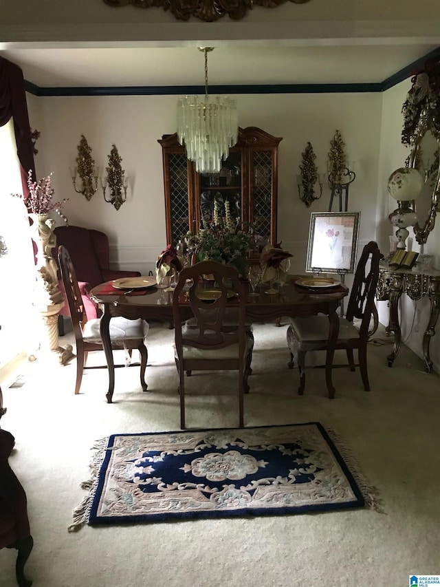 dining area featuring a notable chandelier