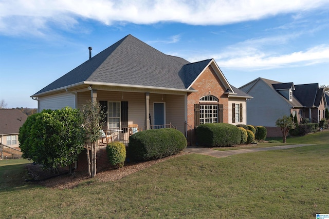 view of front of house featuring a porch and a front lawn