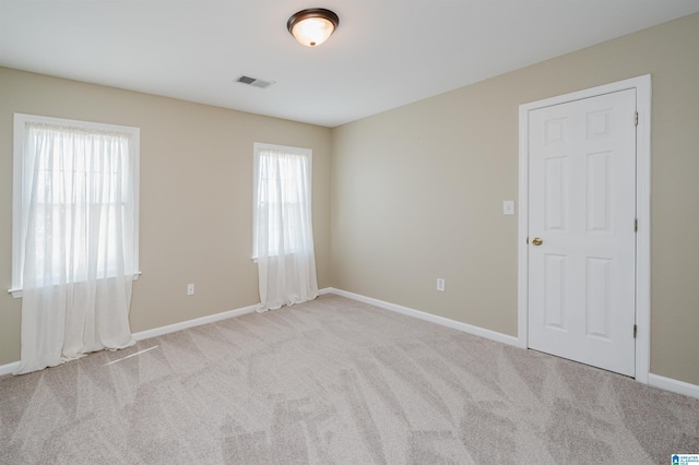 view of carpeted spare room