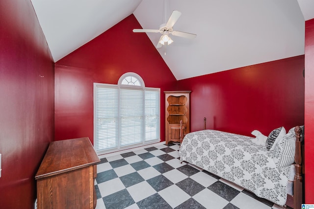 bedroom with ceiling fan and high vaulted ceiling