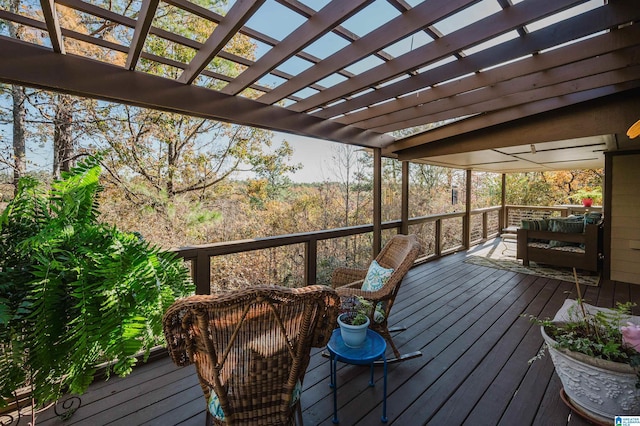 wooden terrace with a pergola