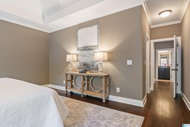 bedroom with dark hardwood / wood-style floors and ornamental molding