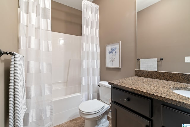 full bathroom with vanity, toilet, and shower / tub combo