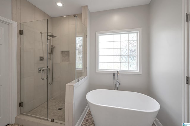 99 Pats Way, Springville, AL 35146 - full bathroom with a freestanding tub, a stall shower, baseboards, and recessed lighting