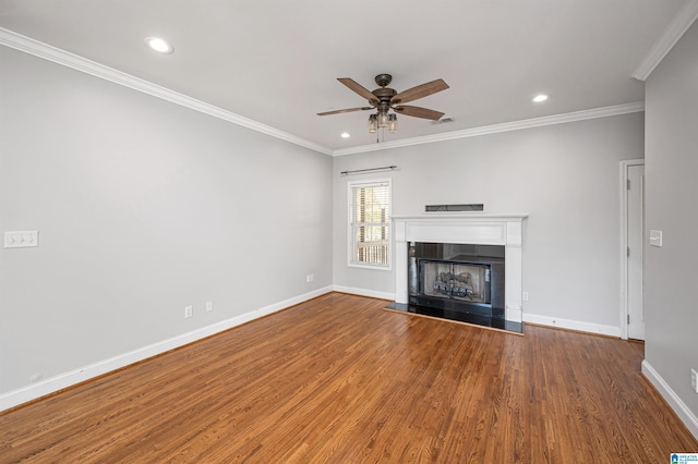 99 Pats Way, Springville, AL 35146 - unfurnished living room with a ceiling fan, a tile fireplace, baseboards, wood finished floors, and crown molding
