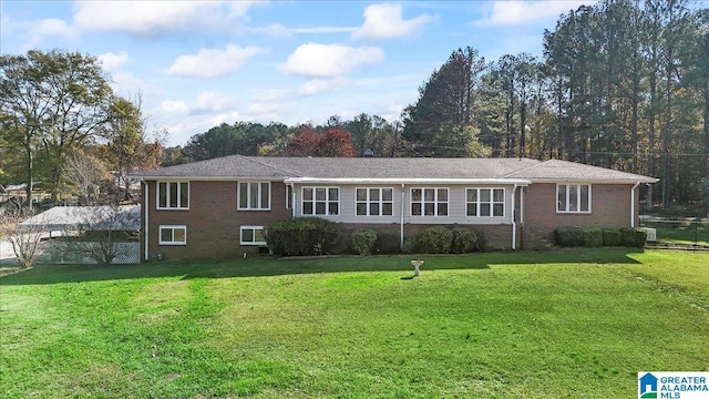 view of front of property with a front lawn