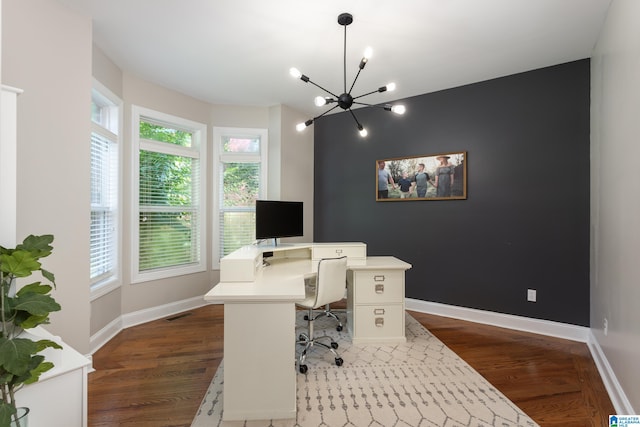 office featuring hardwood / wood-style floors, a wealth of natural light, and a notable chandelier