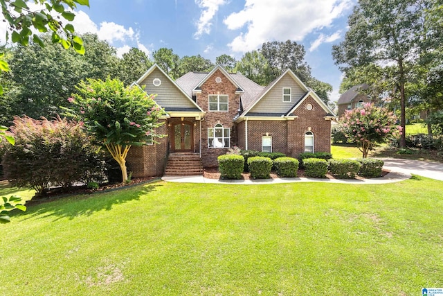 craftsman-style home featuring a front yard