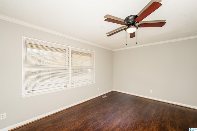 empty room featuring hardwood / wood-style floors, ceiling fan, and ornamental molding