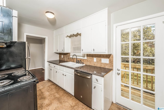 kitchen featuring white cabinetry, sink, refrigerator, and stainless steel dishwasher