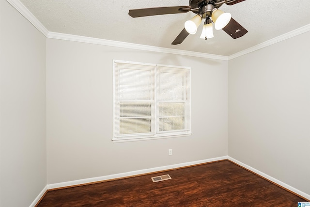 spare room with ornamental molding, a textured ceiling, and hardwood / wood-style flooring