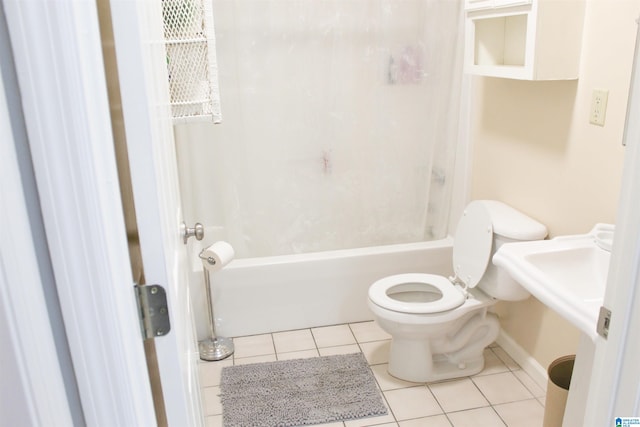 bathroom featuring tile patterned flooring,  shower combination, and toilet