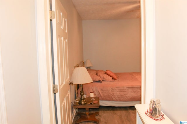 bedroom featuring hardwood / wood-style flooring