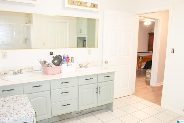 bathroom with vanity and tile patterned flooring