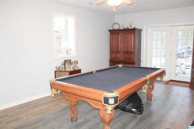 playroom with ceiling fan, hardwood / wood-style flooring, billiards, and a textured ceiling