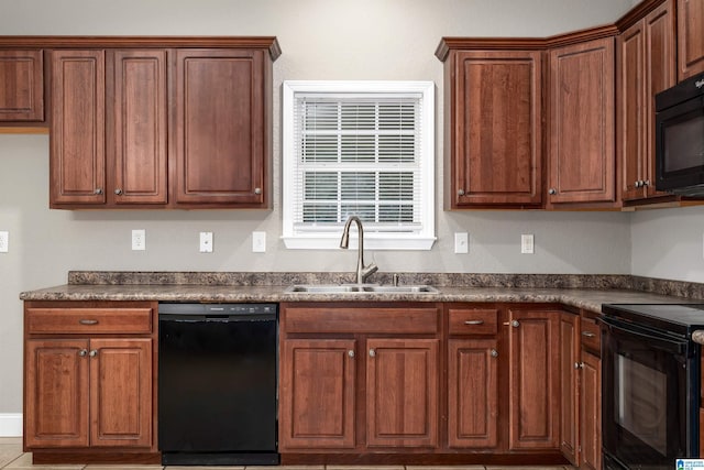 kitchen featuring sink and black appliances