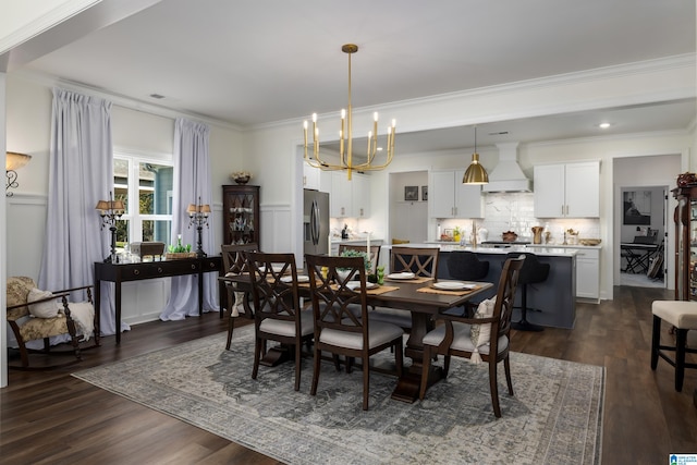 dining room featuring a notable chandelier, dark hardwood / wood-style floors, and crown molding