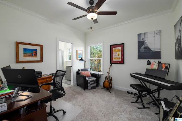 carpeted office space featuring ceiling fan and ornamental molding