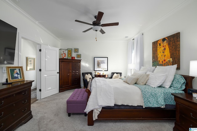 bedroom featuring ceiling fan, crown molding, and light carpet