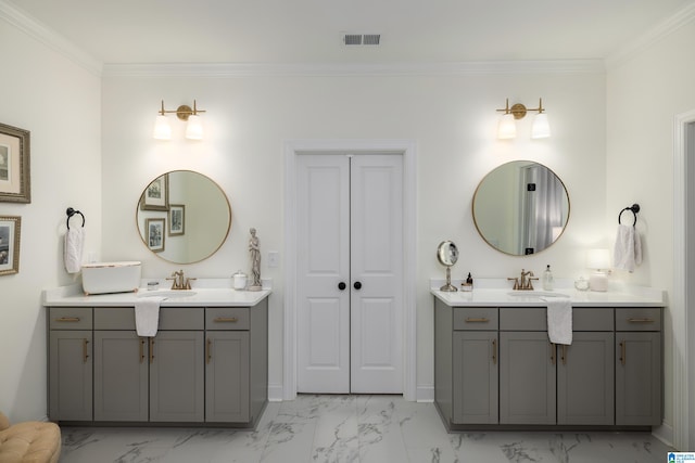 bathroom with vanity and ornamental molding