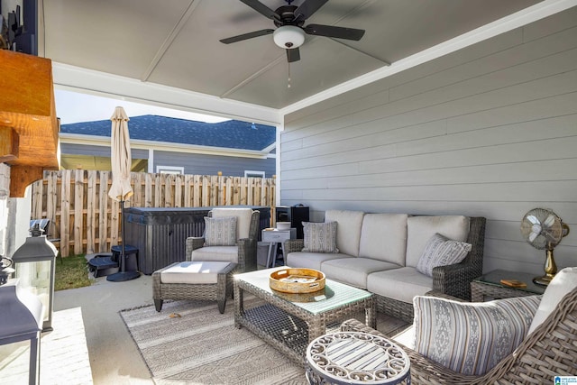 view of patio with outdoor lounge area and ceiling fan