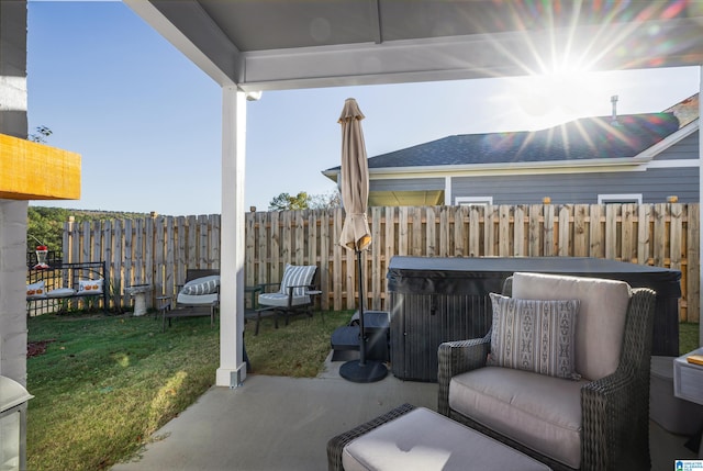 view of patio / terrace featuring a hot tub