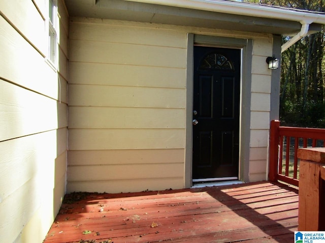 doorway to property with a deck