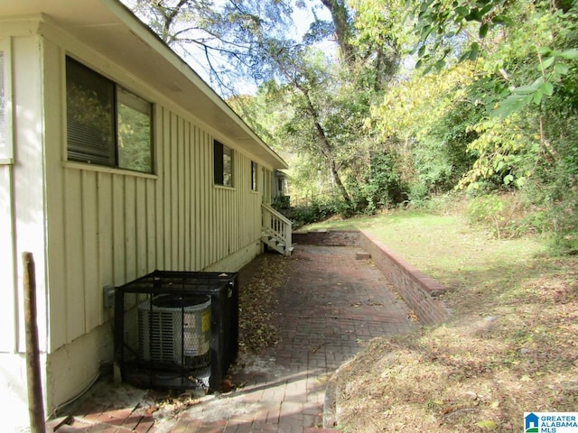 view of yard featuring central AC