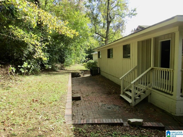 view of home's exterior with a patio area and central air condition unit