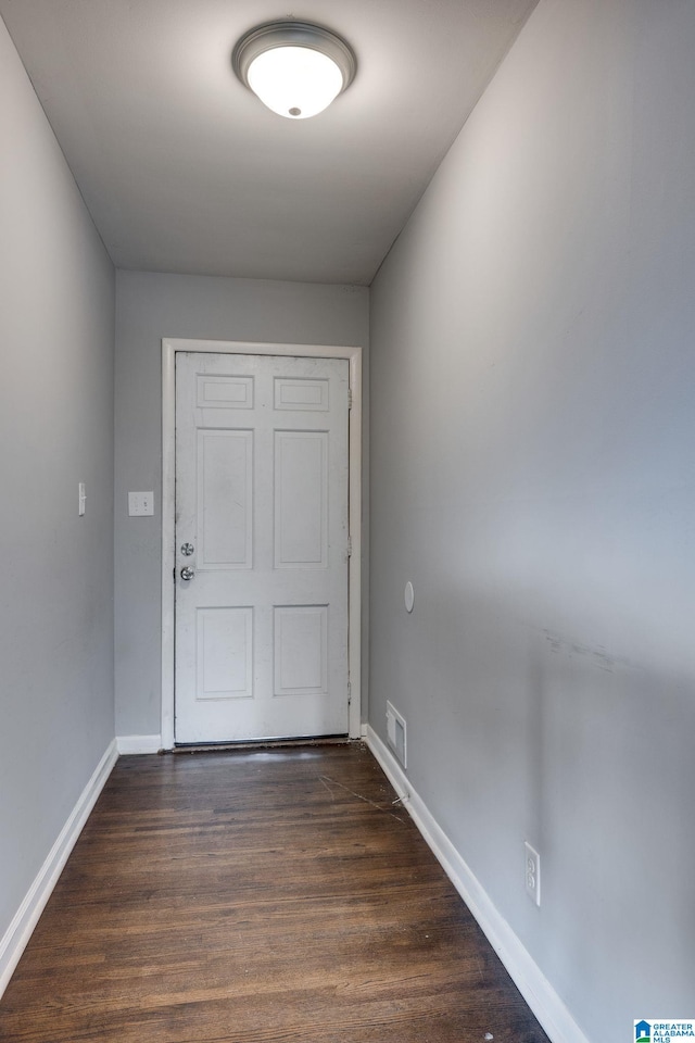 doorway to outside with dark hardwood / wood-style flooring