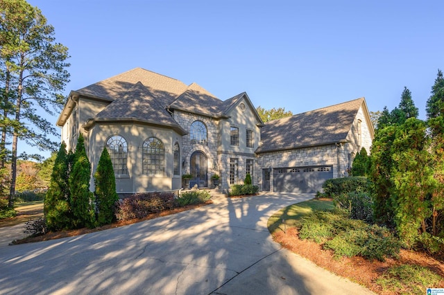 view of front of property with a garage