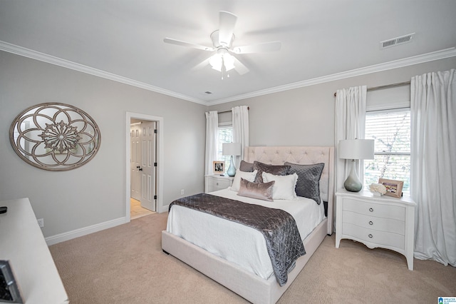 bedroom with connected bathroom, ceiling fan, crown molding, and light colored carpet