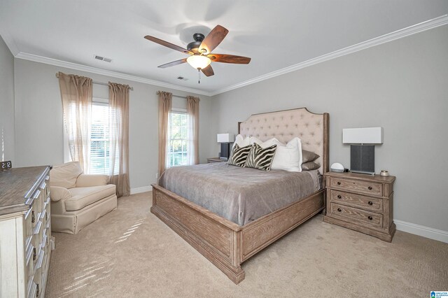 bedroom with light colored carpet, ceiling fan, and ornamental molding