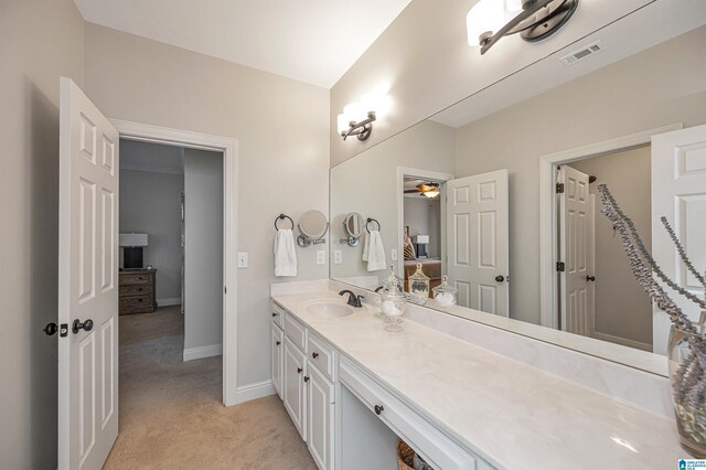 bathroom with vanity and ceiling fan