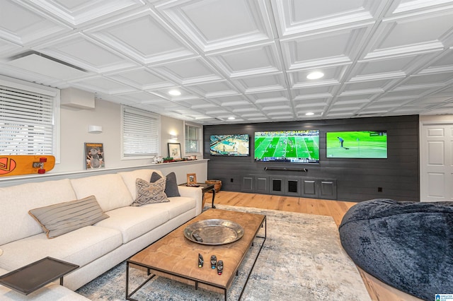 living room featuring hardwood / wood-style floors and coffered ceiling