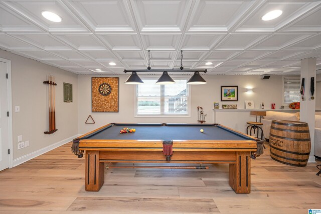 game room featuring light wood-type flooring, pool table, and coffered ceiling