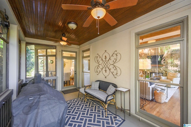 sunroom / solarium with wooden ceiling