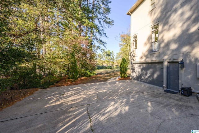 view of home's exterior with a garage