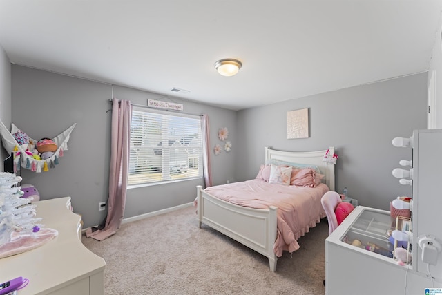 bedroom with light carpet