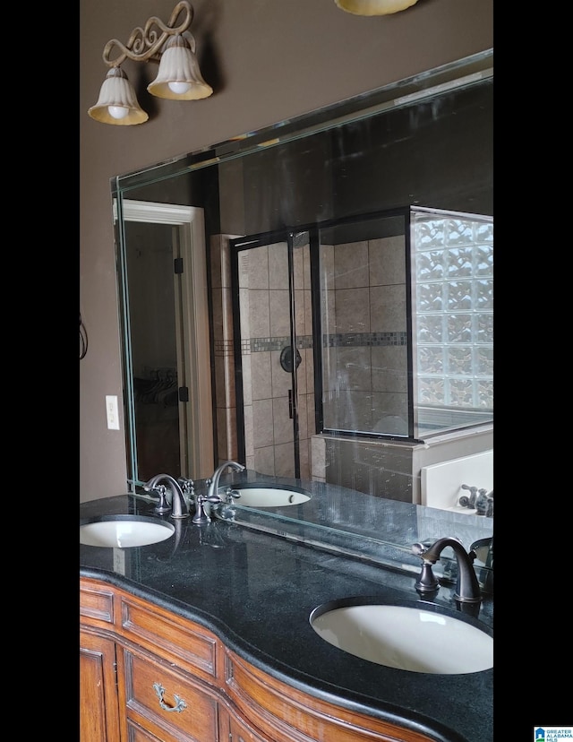 bathroom featuring vanity and walk in shower