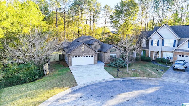 view of front facade featuring a garage and a front lawn