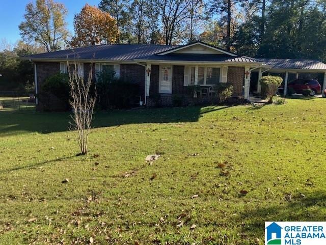 single story home featuring a front yard and a carport